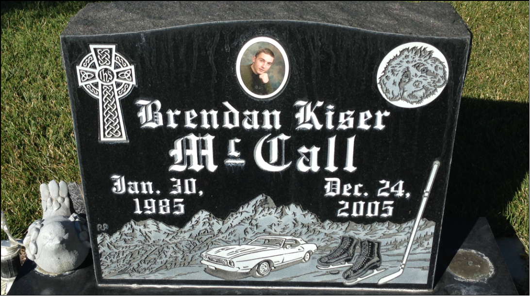 Photo of gravestone that identifies a deceased person named Brendan Kiser McCall, born on January 30th 1985 and died on December 24th 2005