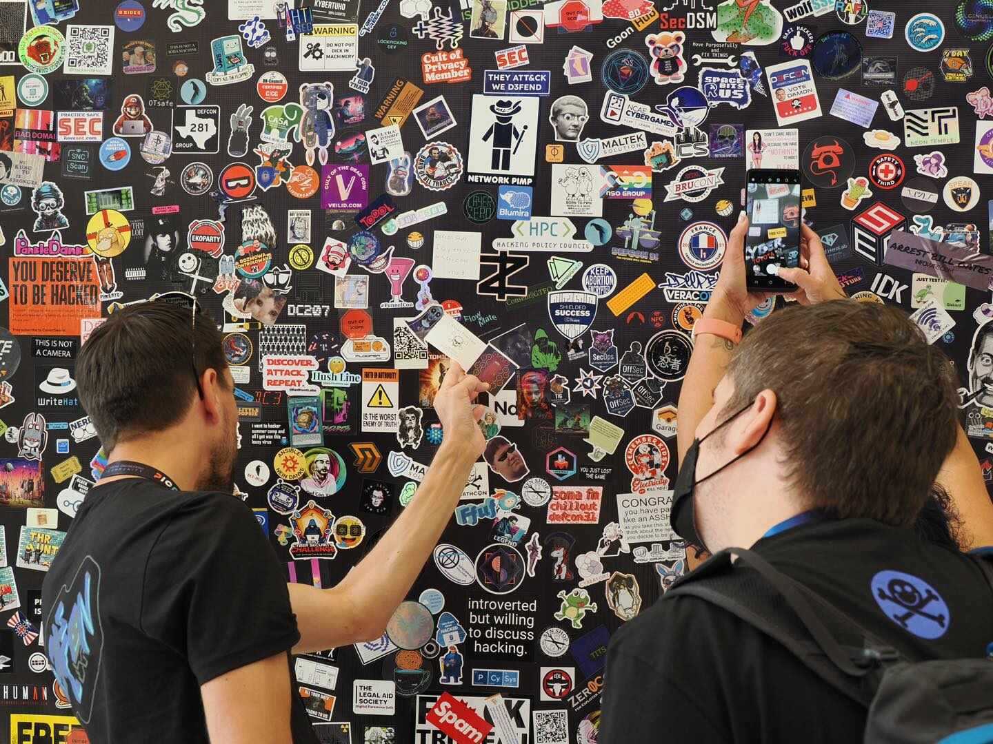 The wall of stickers at DEFCON. Source: DEFCON.